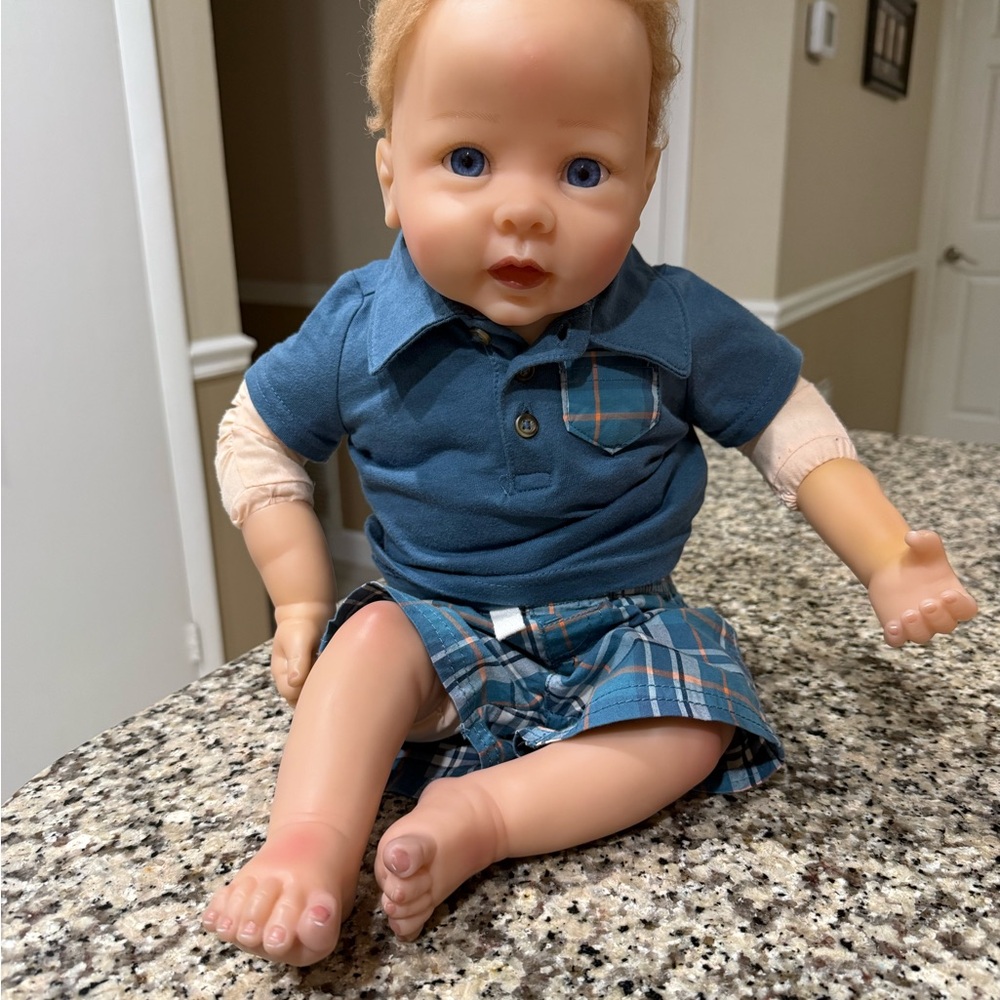 Ashton Drake “Noah Happy as Can Be” reborn doll.